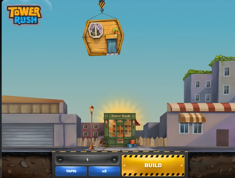 Tower Rush : la grue tient le premier étage, la barre de mise avec TAPIS et x2, le bouton BUILD